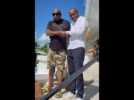Gleaner writer Dave Rodney (left) greets muti- starred Michelin chef Marcel Ravin, hailed as one of the greatest chefs of this generation, at the La Samanna Resort in St Martin.