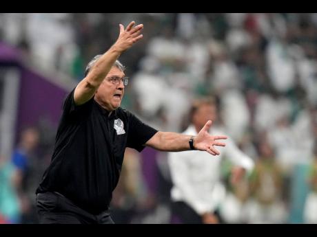Mexico’s head coach Gerardo Martino gestures during the World Cup Group C soccer match against Saudi Arabia at the Lusail Stadium in Lusail, Qatar, yesterday.