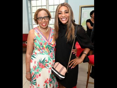 Rosemarie Heaven (left), executive director, Institute of Chartered Accountants of Jamaica, and Belinda Williams, assistant vice-president and group chief marketing officer, PROVEN Management Limited, were primed to celebrate. 