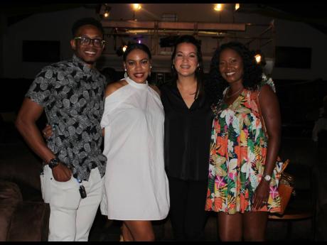 It was a ‘brand managers link up’ (from left) for Charles Chocolate’s Adrian Moore, Devon Biscuits’ Sherene Bryan and Sunshine Snacks’ Shantell Hill-Afonso, posing with Meet The Mitchells co-creator and former recording artiste Tami Chin. 