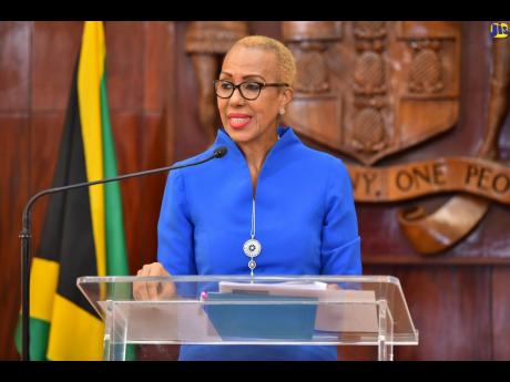 Education and Youth Minister, Fayval Williams, addresses December 1 quarterly press conference of the Education Transformation and Oversight Committee at Jamaica House. JIS