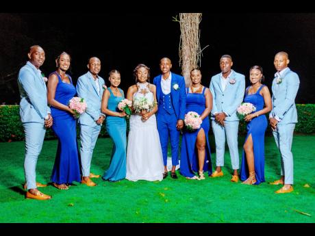 Meet the Thompsons’ royal bridal party. From left: Mickie Henry, Jhenell Scott, Oshane Carter, Melisa Henry, the bride and groom, Simone Thompson-Allen, Odane Anderson, Shafeeqah Abdul-Jabbar and Kevor Kelly.