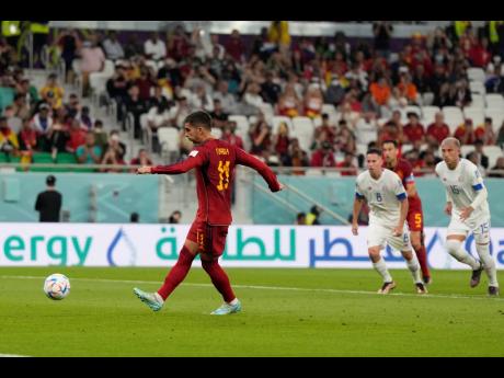 Spain’s Ferran Torres scores a penalty during the World Cup Group E  match between Spain and Costa Rica at the Al Thumama Stadium in Doha, Qatar on  Wednesday, November 23, 2022.