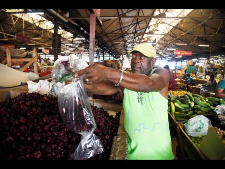 Coronation Market vendor Fitzroy Pusey is hopeful that the remaining weeks of December will offer better fortune for sorrel sales. He has suffered losses from spoilage and a cut in prices.