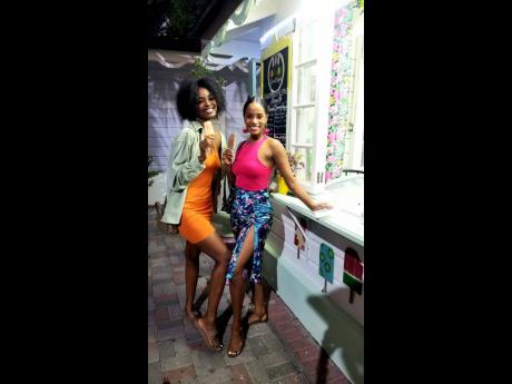 The former Miss World, Toni Ann Singh (right), takes her cousin, Miss Universe Jamaica 2022, Toshami Calvin, for paletas at Tam Jam.