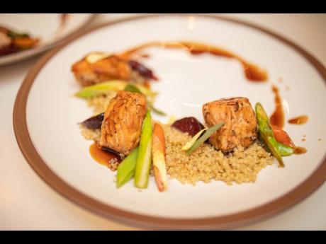 The Fromage pomegranate glazed salmon with honey balsamic roasted vegatable medley and a herbed quinoa pilaf paired ever so well with the Ménage À Trois Gold chardonnay.