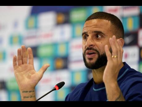 England’s Kyle Walker speaks to the media during a press conference at Al Wakrah Sports Complex, in Al Wakrah, Qatar, yesterday.