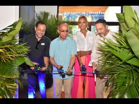  From left: Chukka Adventures’ Marc Melville; Deputy Prime Minister Horace Chang;, Julian Dixon, CEO, Sotheby’s Jamaica; and Tropical Battery’s Daniel Melville officially cut the ribbon to open the Fairview II Shopping Centre offices of Sotheby’s I