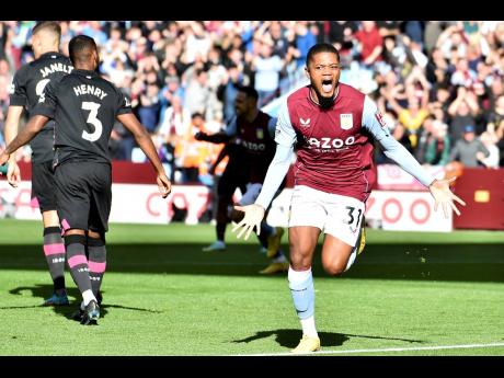 Aston Villa’s Leon Bailey celebrates after scoring the opening goal during the English Premier League match against Brentford at Villa Park in Birmingham, England, in October.