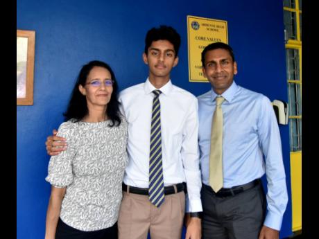 Aayush Jain (centre) of Ardenne High School with mom Alka and dad Alok.