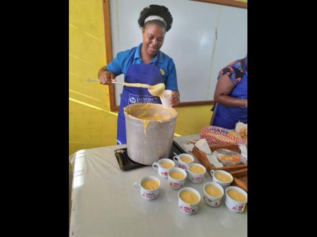 Tashiana Squire-Cole serves porridge at Rosemount Primary and Infant School.
