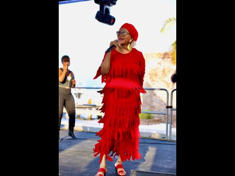 Marcia Griffiths delivered a sweet serenade in a festive and fitting red.