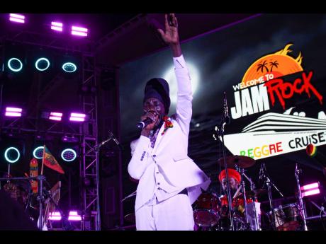 Reggae-dancehall star Sizzla sings passionately for the women and the children early in his set.