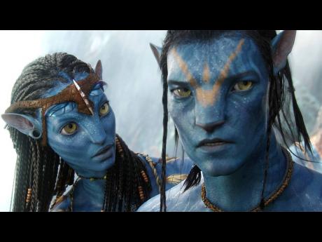 Zoe Saldana as Neytiri and Sam Worthington as Jake Sully in ‘Avatar: The Way of Water’.