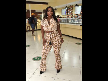 Dancehall artiste and principal of the Single Mother Foundation, Pamputtae chose an earth-toned sporty pants set as her date night outfit.