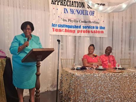 Dr Michelle Pinnock (left), regional director for the Ministry of Education’s Region Four, delivers the keynote address during an appreciation dinner held for Phyllis Cooke-Sterling, a retired teacher who served at the Somerton Primary and Infant School 