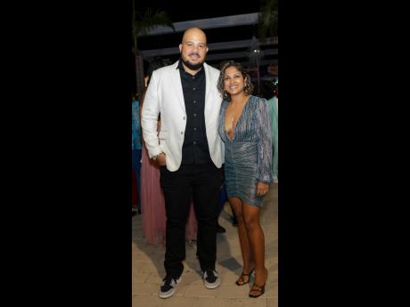 Businessman Andrew Bellamy (left) and wife Corrinne Bellamy, assistant vice-president, EBA Actuarial Services, EBA Ltd, are ready to party.