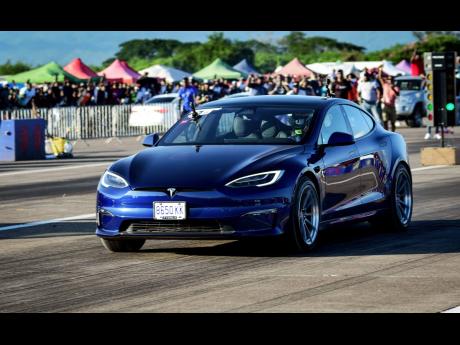The Tesla Plaid recorded the fastest time for the day, which was 9.719 seconds over the quarter-mile.