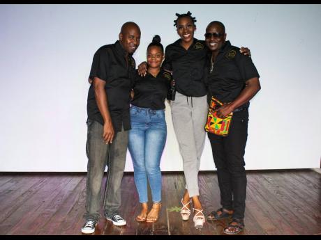 The Wasomi team, (from left) Photographer, Orville Spence, Social Media Manager, Vannae Hinds, Model Coach, Martha McGregor, and Socioeconomic Inaugurator, Phil Edwards  are all smiles following a successful launch and fashion show. 