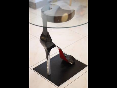 For women who love shoes, the ‘Steeletto’ table by Craigy T is a stylish addition. 