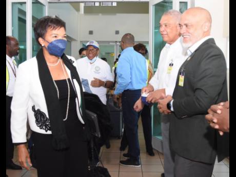 From Left: Audrey Marks, Jamaica’s ambassador to the United States, is greeted by Donnie Dawson, deputy director of tourism, Jamaica Tourist Board; and Robin Russell, president, Jamaica Hotel and Tourism Association. 