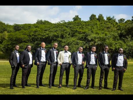 The groom and his groomsmen show that some things are truly better in black and white.