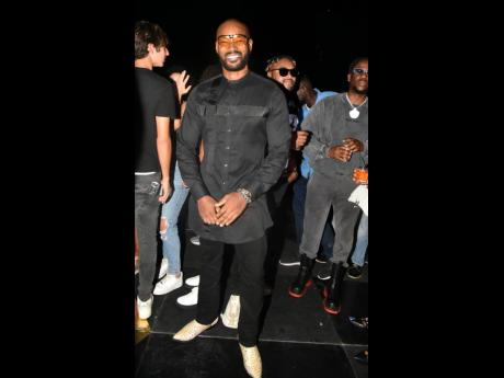 Model Tyson Beckford rocked all black complemented with snake skin boots for the occasion.