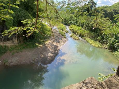 An aerial view of the section of the Thomas River in Chapelton, Clarendon, where both Brehanna Sindale and Remo Douglas drowned last Friday. 