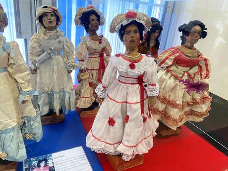  An exhibit of dolls representing the Set Girls.