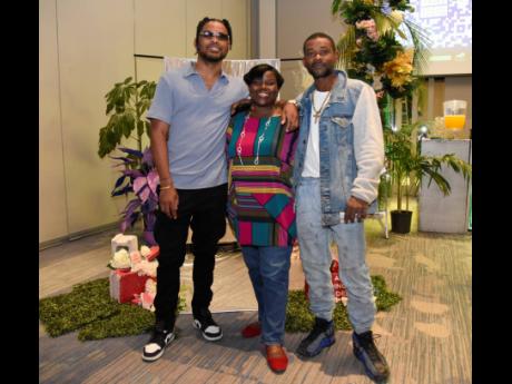 It was a family affair at the opening of the exhibition for (from left) Bonito ‘Don Dada’ Thompson with his mother Angela Marie Williams, and brother Orlando Minnis.