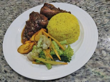 This tasty meal was prepared using Kulture Kravings marinades. The Tumeric marinade for the rice, and the Fricassee marinade was used to prepare the chicken, which was complemented with a side of fried plantains, sauteed carrots and broccoli. 