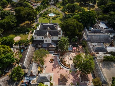 In this aerial photograph taken on Friday, the newly paved Devon House courtyard can be seen at the front of the property.