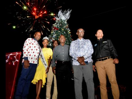 From left:  Andrew Swaby, People's National Party councillor, Vineyard Town Division; Miss Jamaica Festival Queen 2022 Velonique Bowen;  Khijani Williams, youth mayor for Kingston and junior councillor for the Greenwich Town Division; Custos Rotulorum of K