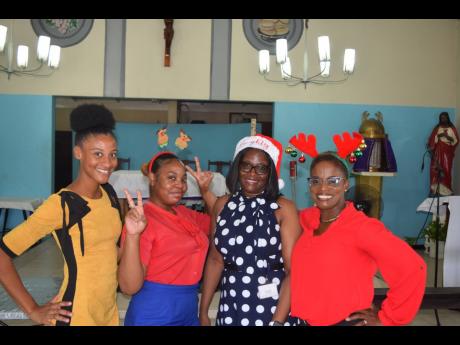 The SAJ team which led the Greenwich Farm elderly treat (from left): Nicola Stephenson, receptionist at SAJ Property Services Limited; Celine Daley, SAJ accounts payable clerk; Dionne Mason Gordon, SAJ operations manager – member services; and Jean Hinds