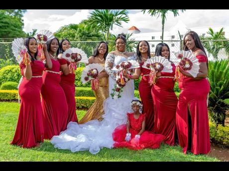 The bride shares her special day with her supportive bridesmaids.