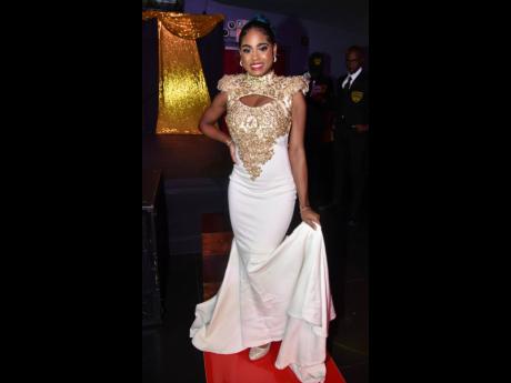 Crystal Davis supported her mother, Carlene Smith, in a floor-length Grecian-inspired gown. 