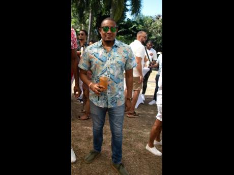 Member of Parliament Floyd Green moved the fashion metre in a tropical shirt which he, of course, paired with green Clarks and aviators.
