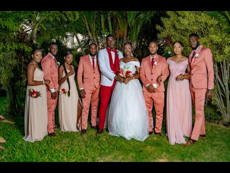 Main pic: The Mannings’ bridal party (from left): Peta-Gay Williams, Romayne Manning, Amoya Osbourne, Rushaun Lindo, Dwayne Lewis, Amoy Ellis and Andrean Williams were happy to give their support on the big day.  