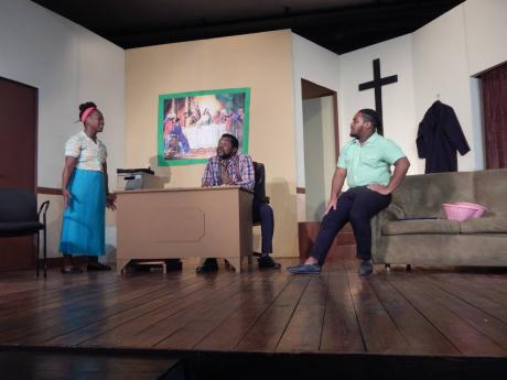 The three characters in Basil Dawkins’ play have a serious discussion.