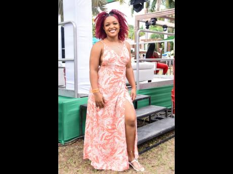 You can never go wrong with a maxi dress, and Mickalia Huie is right in style.