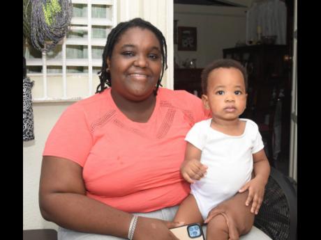 Tiffany Ellis with her son Xien Ellis at their home on Monday, July 11, 2022.