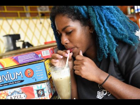 After visiting a board game cafe in Toronto, Canada, Nadia Parkins, a coffee and game lover decided to open one here in Jamaica.