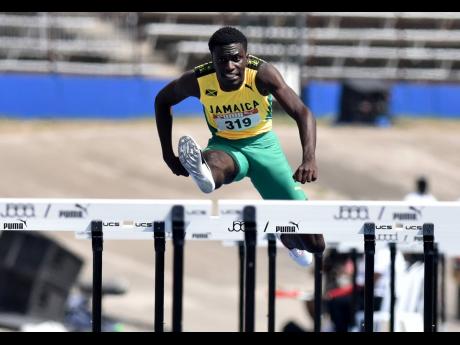 Demario Prince in action for Jamaica at the Carifta Games in June last year at the National Stadium.