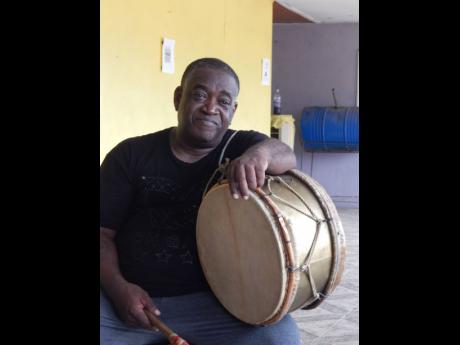 Renford Foster, leader of the Southwest St Andrew Jonkunoo group, with his bass drum.