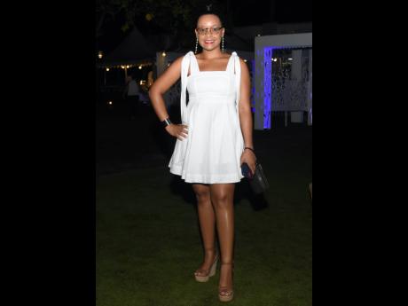 Cait-Amoi Goulbourne put on a leggy display in wedges and a white babydoll dress.