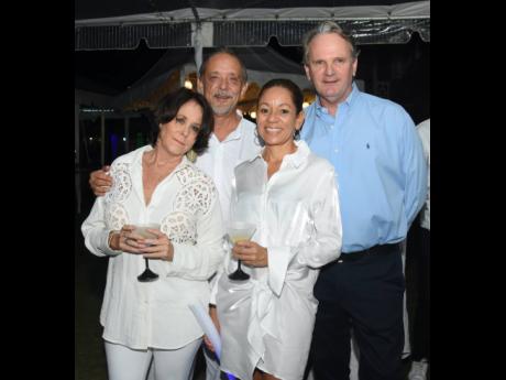 Our camera captured (from left): Alex Ghisays, group public relations director, Couples Resorts; Evan Thwaites, managing director, IronRock Insurance; Martine Fontaine of Fraser Fontaine & Kong; and Gary Stephens, vice-president of operations, Couples Reso