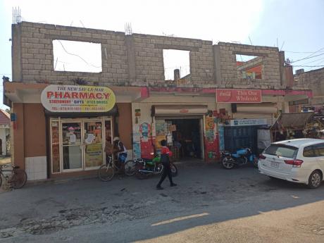 The supermarket in Savanna-la-Mar, Westmoreland, where an alleged robber was shot dead on Sunday.