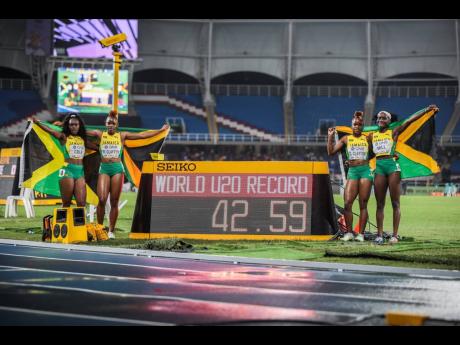 Jamaica's quartet of (from left) Serena Cole, Tina Clayton, Tia Clayton, and Kerrica Hill celebrate breaking the 4x100-metre world under-20 record in the final at the World Under 20 Championships in Cali, Colombia on Friday, August 5, 2022.