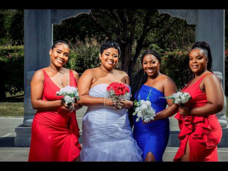 Troy-Ann’s wedding day was even better with her supportive bridemaids by her side. From left: Jade McIntosh, the beautiful bride, maid of honour Nicole Darby and Dazmin Henry.