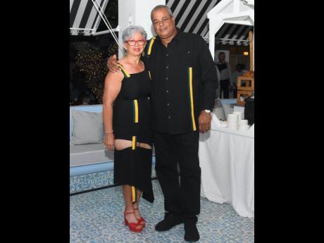 We love a coordinated couple! Susan White and husband Richard donned matching outfits for Reggae Kulcha Explosion. 